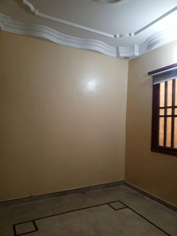 Portion for rent 2 bed dd in block 12 gulistan e johar 7