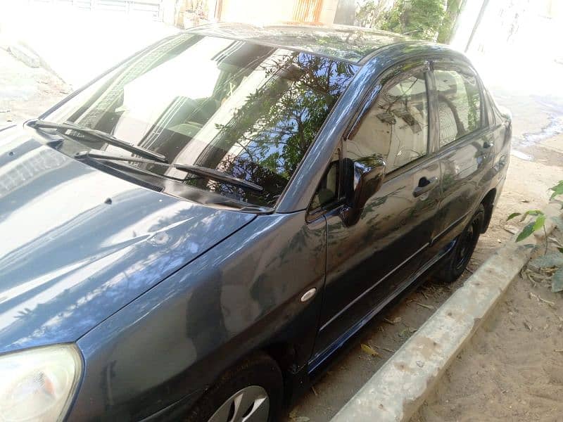 Suzuki Liana 2007 better alto,cultus,lancer 3