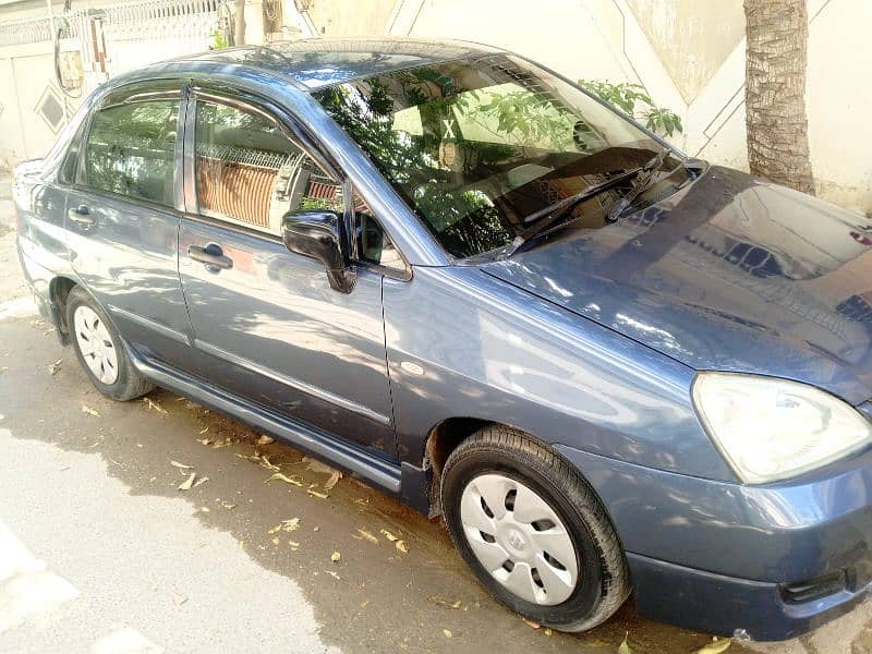 Suzuki Liana 2007 better alto,cultus,lancer 9