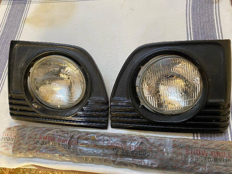 Suzuki Bolan/Ravi headlights with New Grill 0