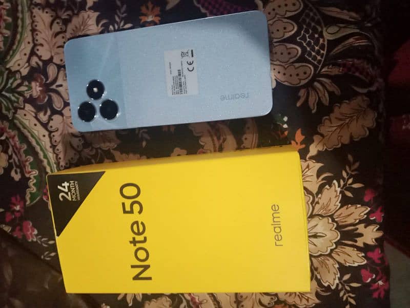 Realme note 50 with box 2 years warranty available 4 /64 0