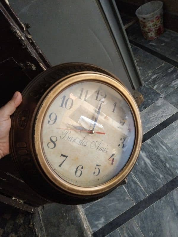 antique clock in pitaal materials 1