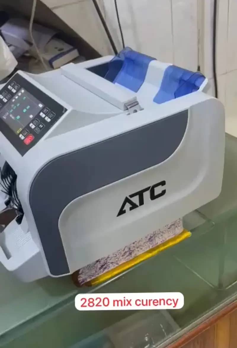 cash counting machine with fake note detection 1 year warranty. ATC 9