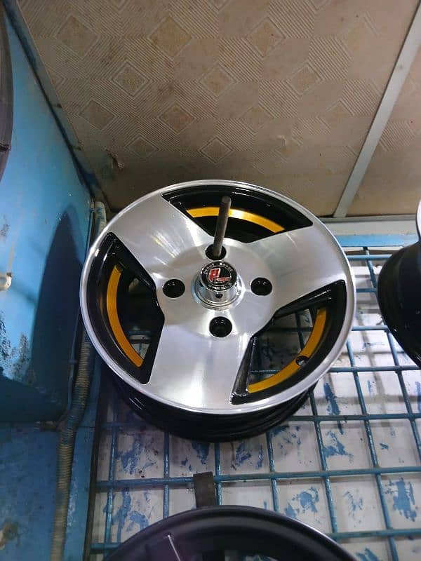 tyres rims alloy wheels dunlop michelin genral yokohama alto mehran fx 14