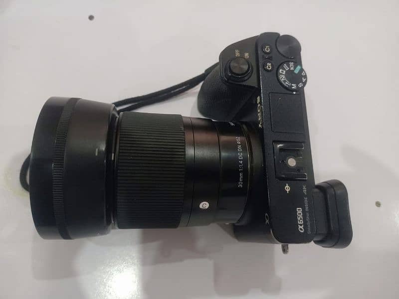 Sony a6500 mirrorless DSLR camera with lens 30mm 1.4 dc dn sigma 3