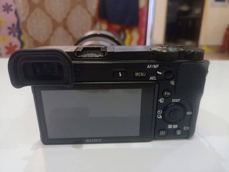 Sony a6500 mirrorless DSLR camera with lens 30mm 1.4 dc dn sigma 4