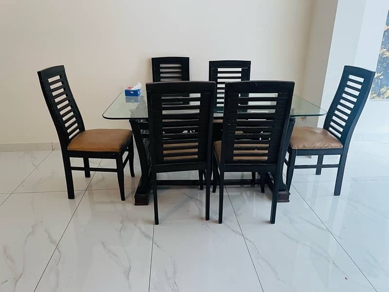 Six seater dining table set with glass top 0