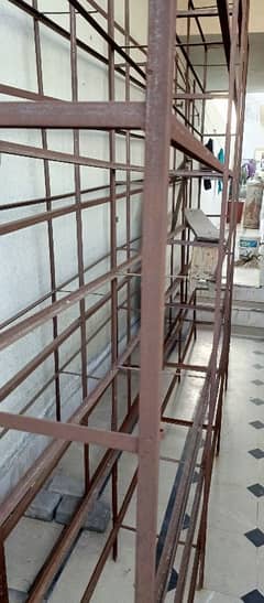 iron racks with hardboard sheets