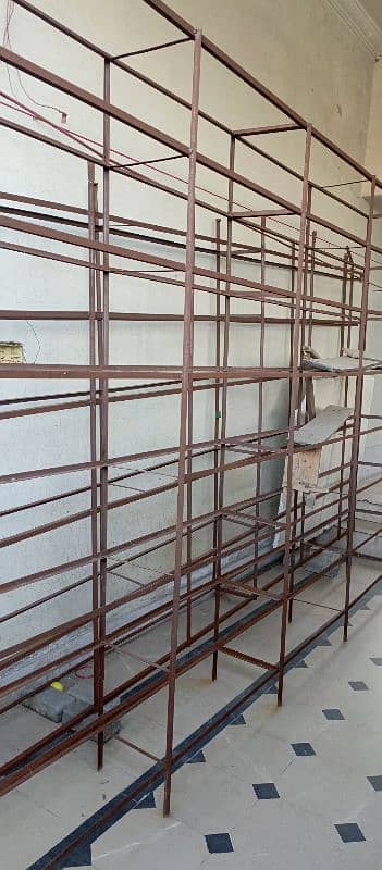 iron racks with hardboard sheets 1