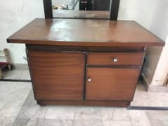 wooden table with 2 large cabinets and 1 drawer