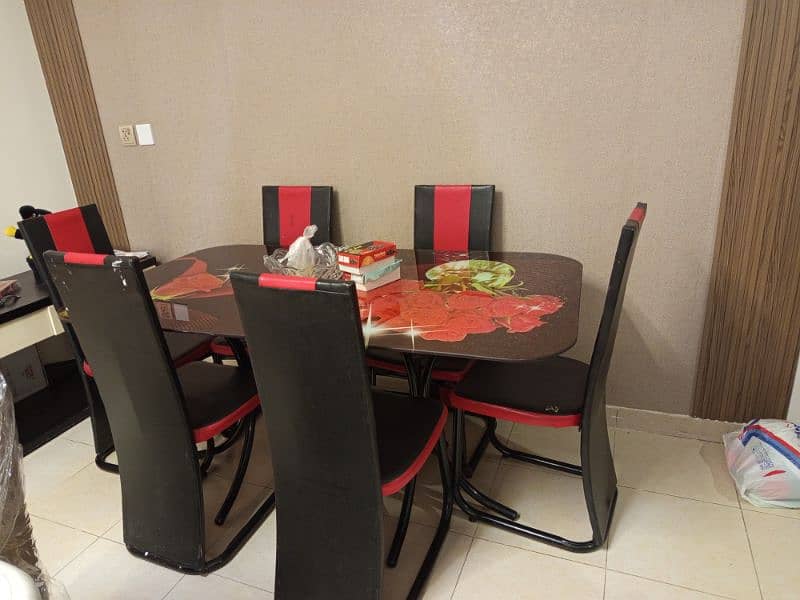 iron rod dining table with six leather chairs. . . 0