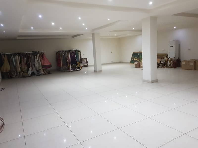 Spacious Shop Is Available For Rent In Ideal Location Of MM Alam Road 4