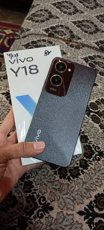 vivo y18 4+128 box+charge 9 month warranty 0