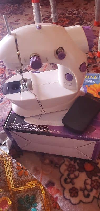 mini electric sewing machine 0