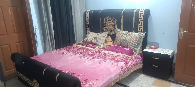 most beautiful black bed with one side table 3