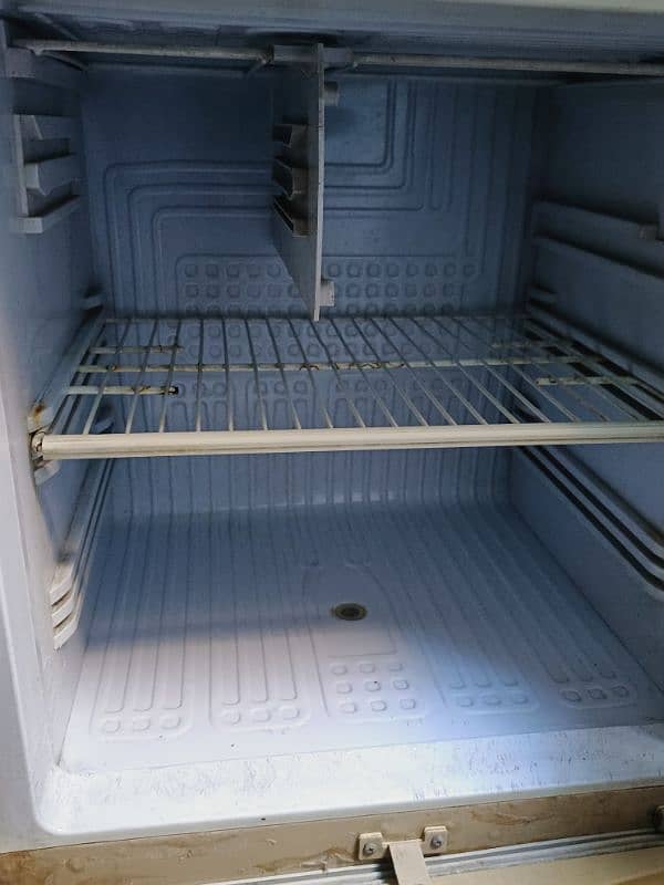 medium size fridge Rs 35000 full working condition 3