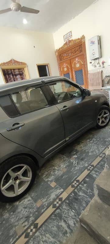 Suzuki Swift 2011 03054631007 3