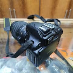 Nikon D5100 with 50mm and flashgun