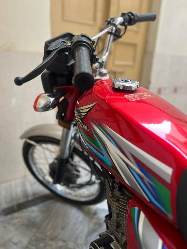 Honda 125 2023 model lush condition all Punjab number 0