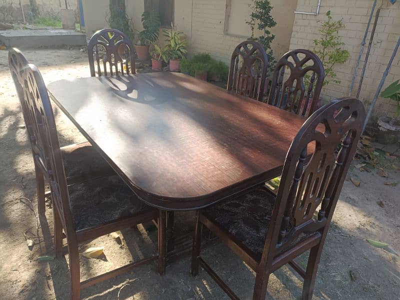 wooden chairs and dining table 1