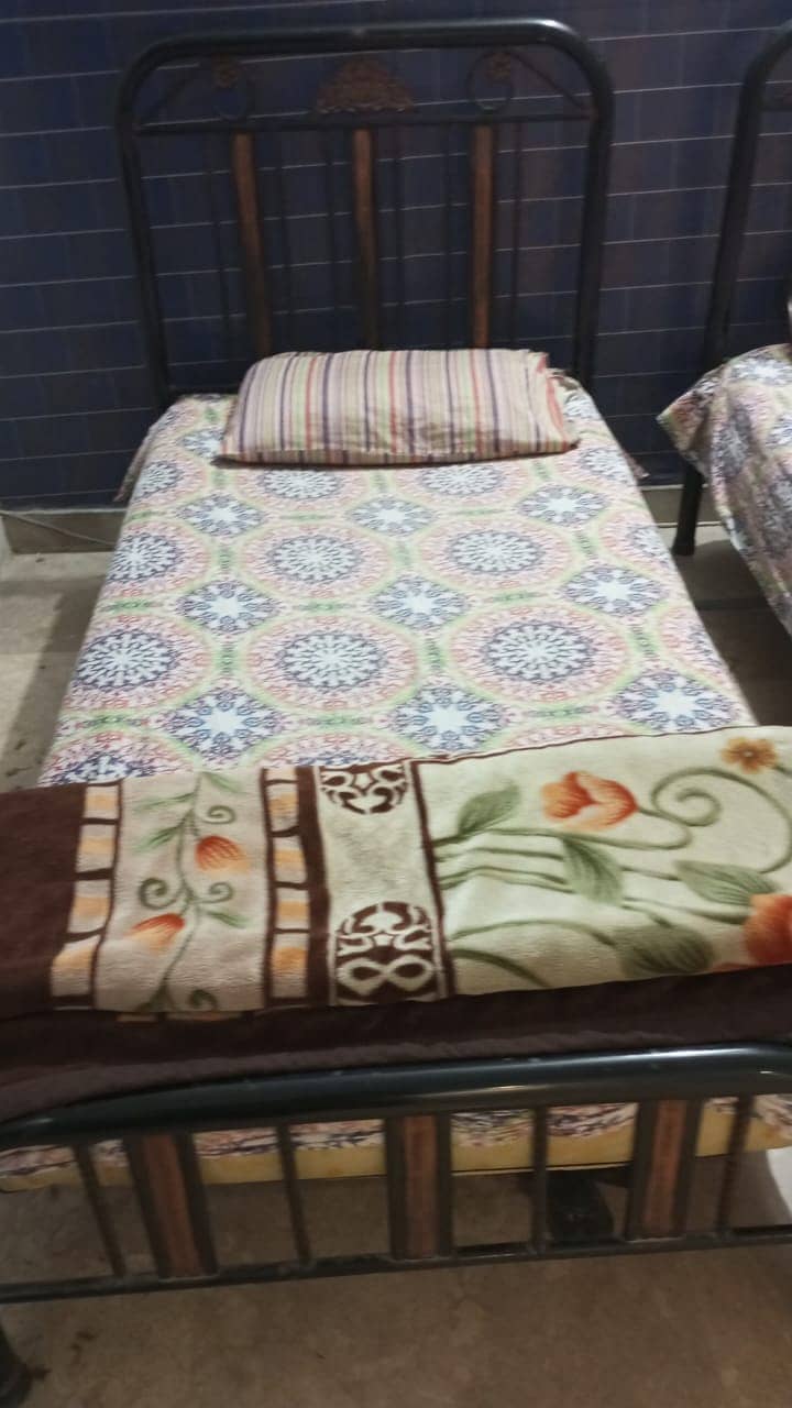 Two single iron Beds 2