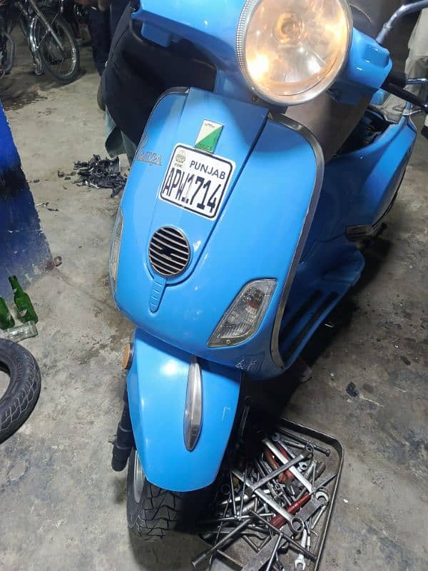 united scooters,electronic scooters,49cc scooties available 12