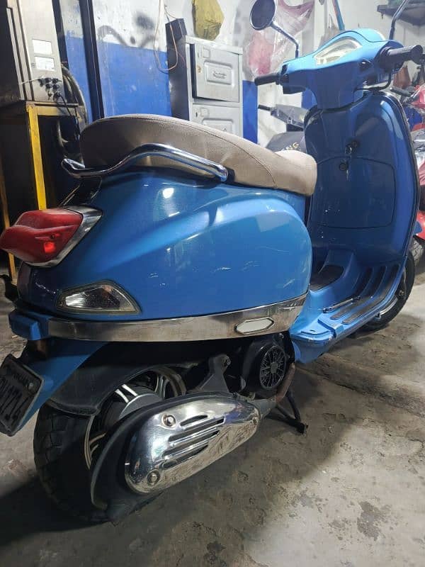 united scooters,electronic scooters,49cc scooties available 14