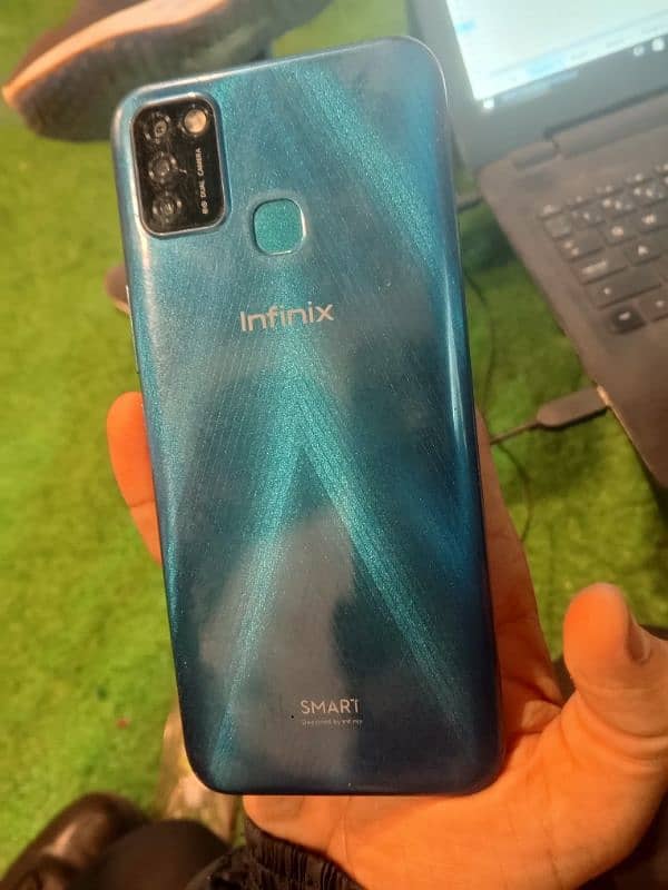 infinix smart 7 2/32 condition 9/10 only glass break all set ok 1