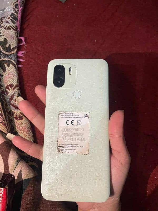 Redmi A2+ with box and charger 4