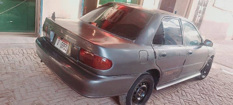 Mitsubishi Lancer 1992.                      AC on 3