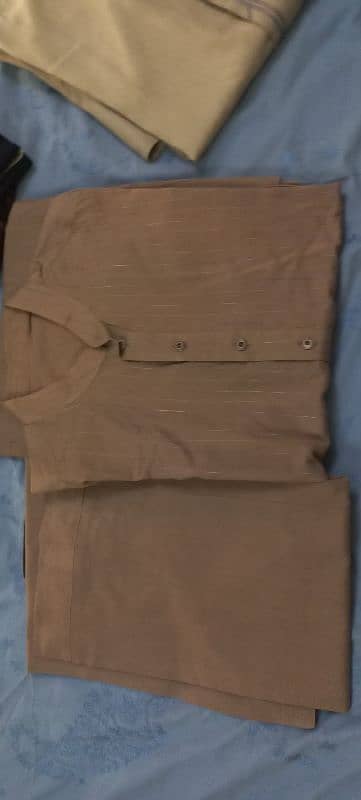 4 pants 2 shirts and 2 stalwar kameez Size XL 14