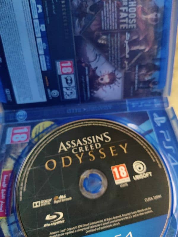 ASSASSIN'S CREED ODYSSEY AND  GOD OF WAR 3 PS4 USED 1