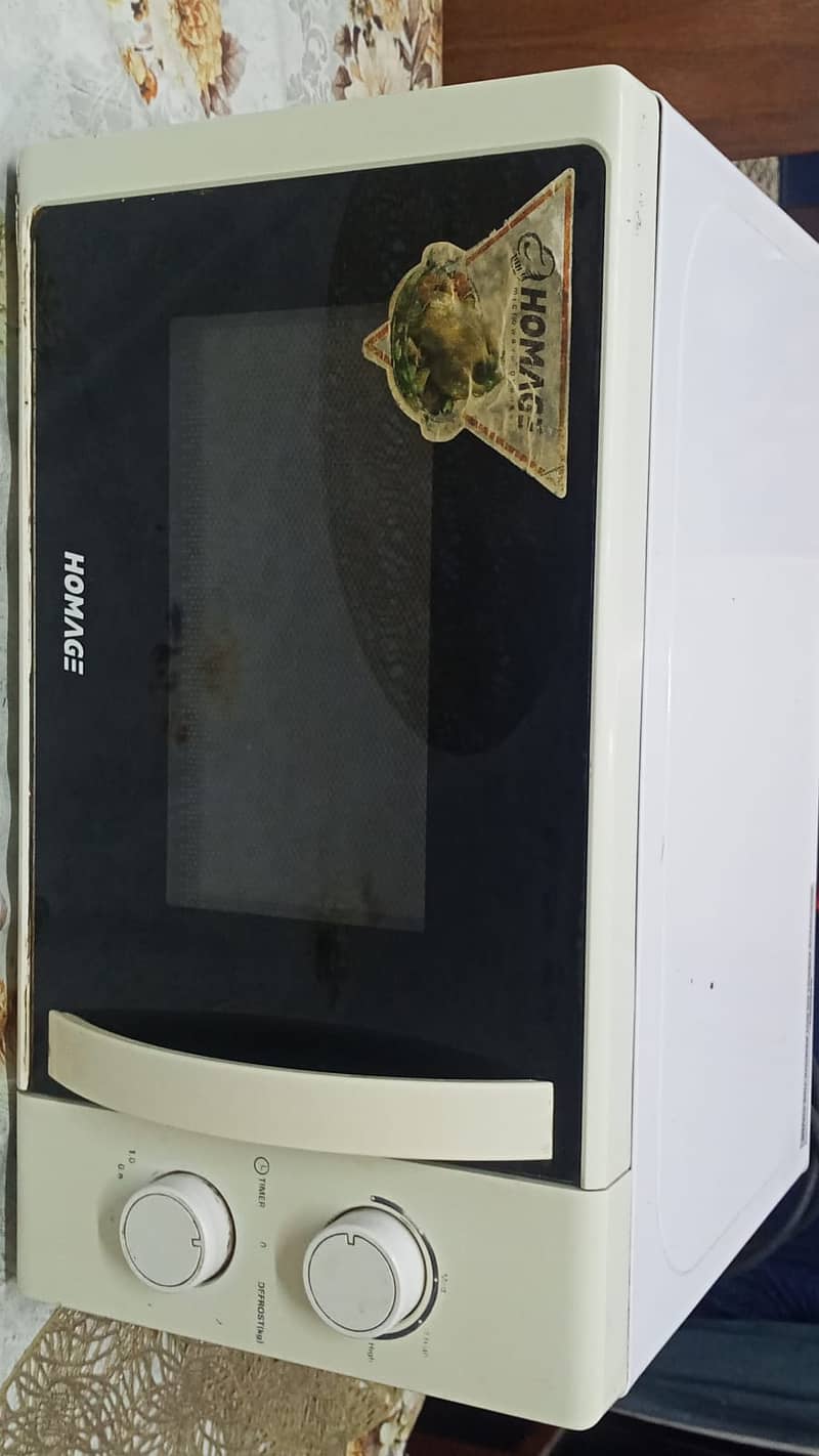 Homage microwave for sale in good working condition 3