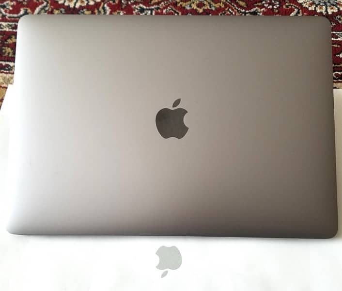 Apple MacBook Pro like new Condition with Touch Bar 7