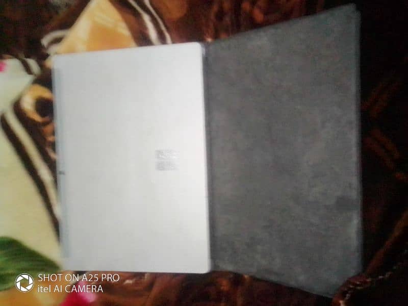 I sell microsoft Mac book 4 GB ram 64 GB memory 2