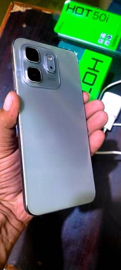 Infinix Hot 50i . . . 03409192304. . . 9 month wrnty