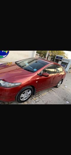 Honda City 2010 manual habanero red colour