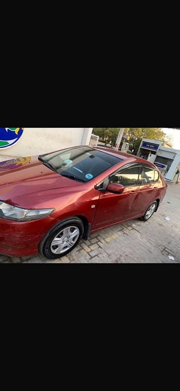 Honda City 2010 manual habanero red colour 0