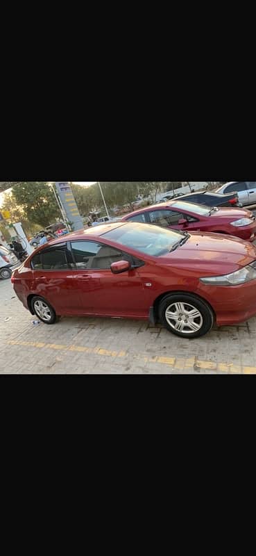 Honda City 2010 manual habanero red colour 6