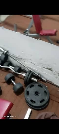 gym dumbell barbel rod and plates