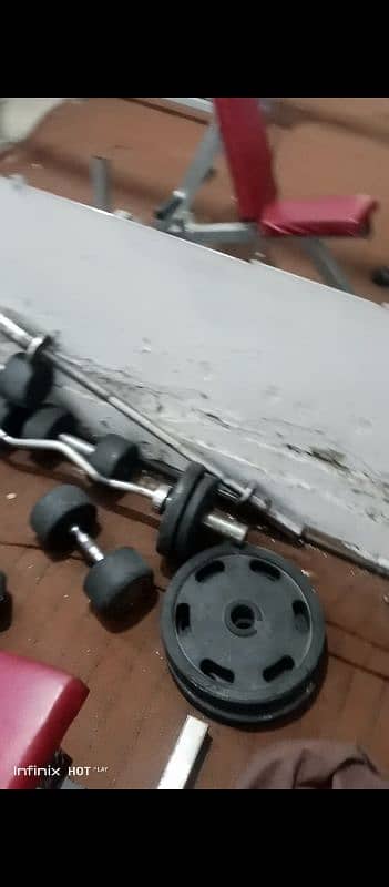 gym dumbell barbel rod and plates 0