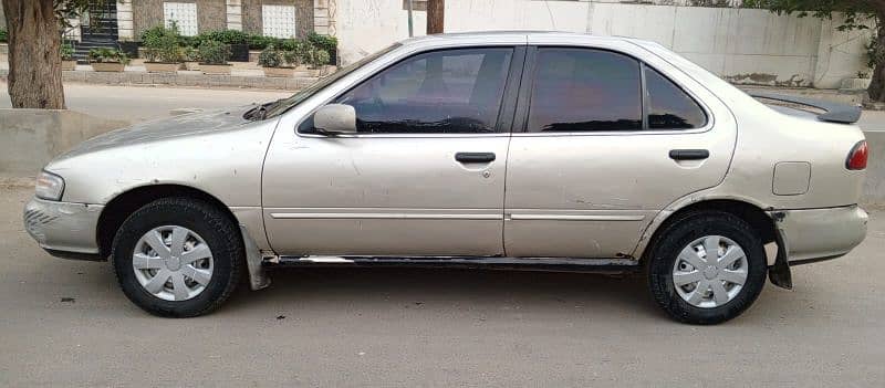 Nissan Sunny 1997 (B14) 7