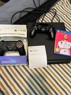 Playstation 4 Slim with 2 controllers & fifa 20