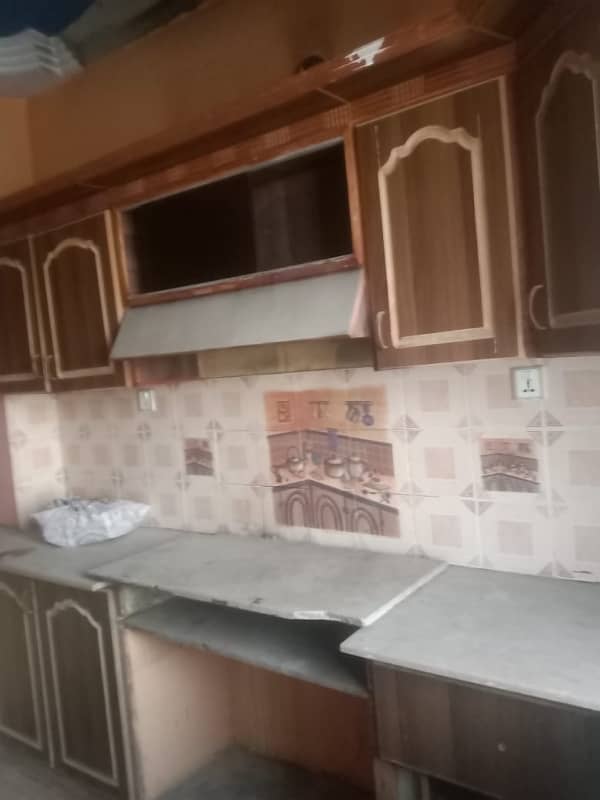 Independent double story 6 bed dd 2 kitchen boundary wall society Opposite block7 jauhar 5