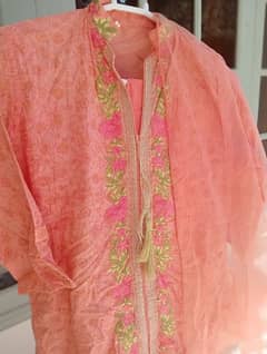 Stylish Peach shirt with round daman, plazo and net dupatta with frill