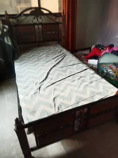 single bed with iron design wooden with metress