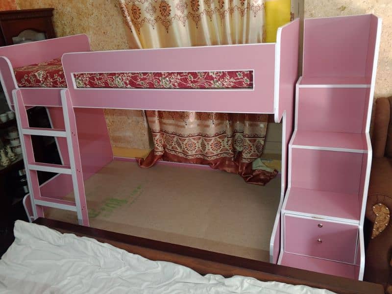Brand new twin over bunk bed with built-in storage compartments. 3