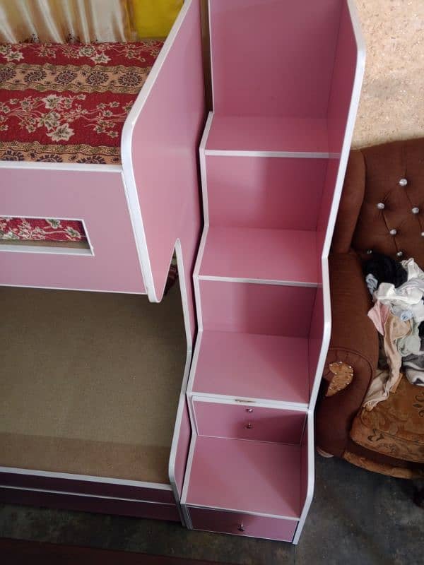 Brand new twin over bunk bed with built-in storage compartments. 4