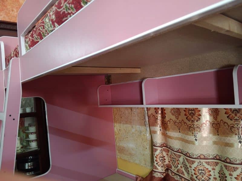 Brand new twin over bunk bed with built-in storage compartments. 5