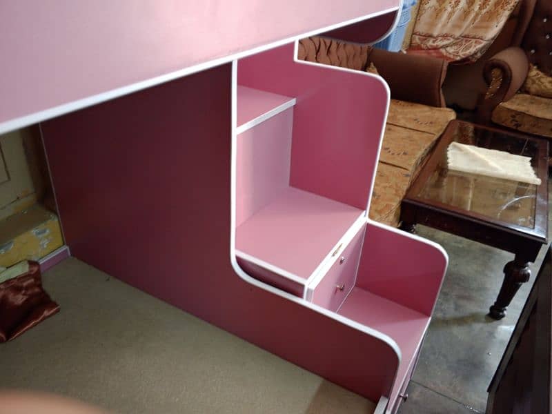 Brand new twin over bunk bed with built-in storage compartments. 6